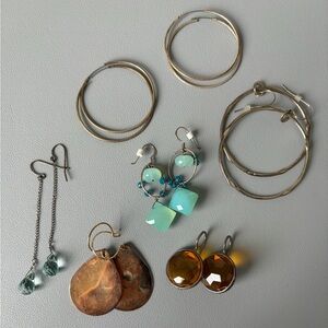Seven (7) earrings - various styles - hoops, beaded, etc